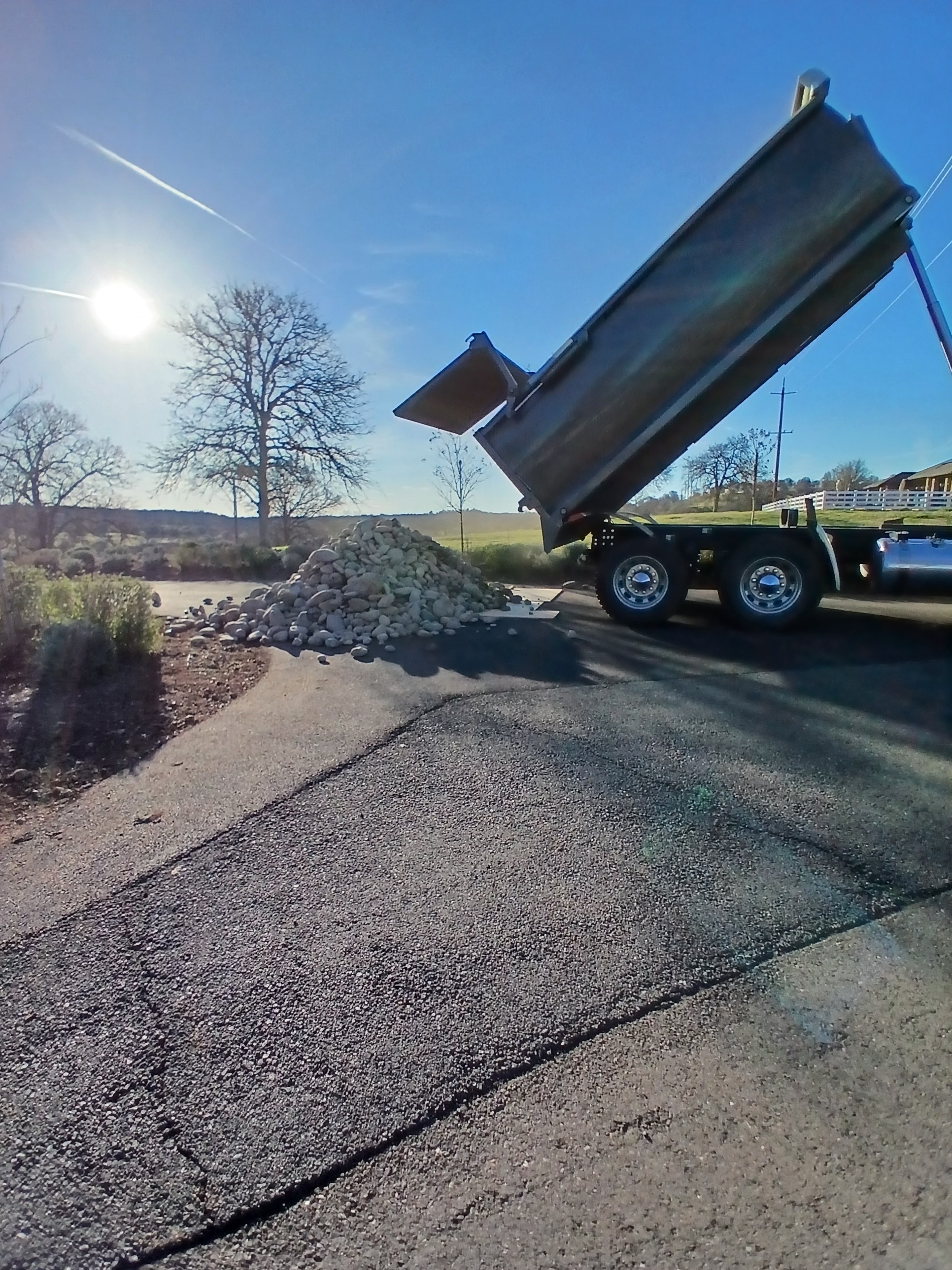 CX Lawn truck on the way to a job site